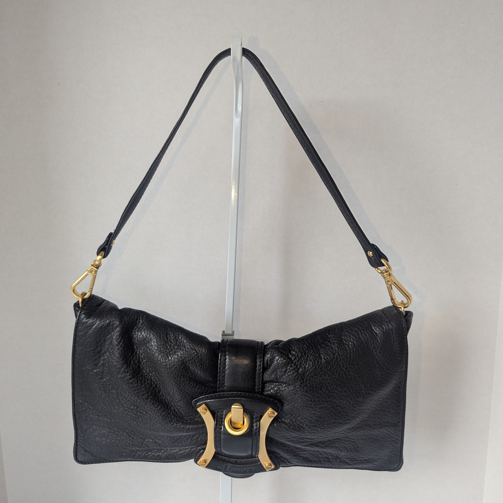 B. Makowsky Black and Gold Shoulder Bag with Sleek Design
